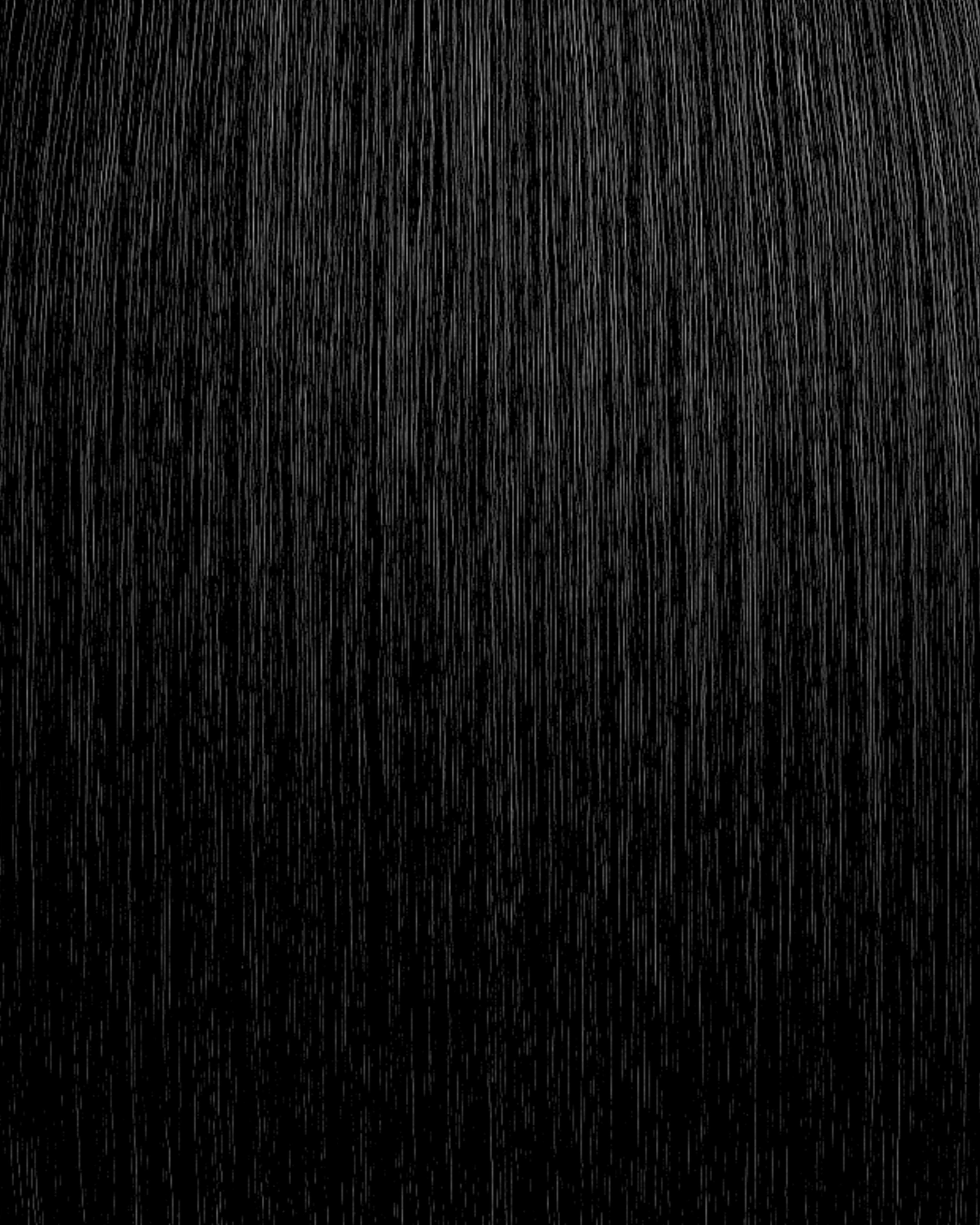 Stitched Hair Effortless Genius Weft™ extensions in true black with 1 ash tone, shown in ultra-deep, sleek strands.