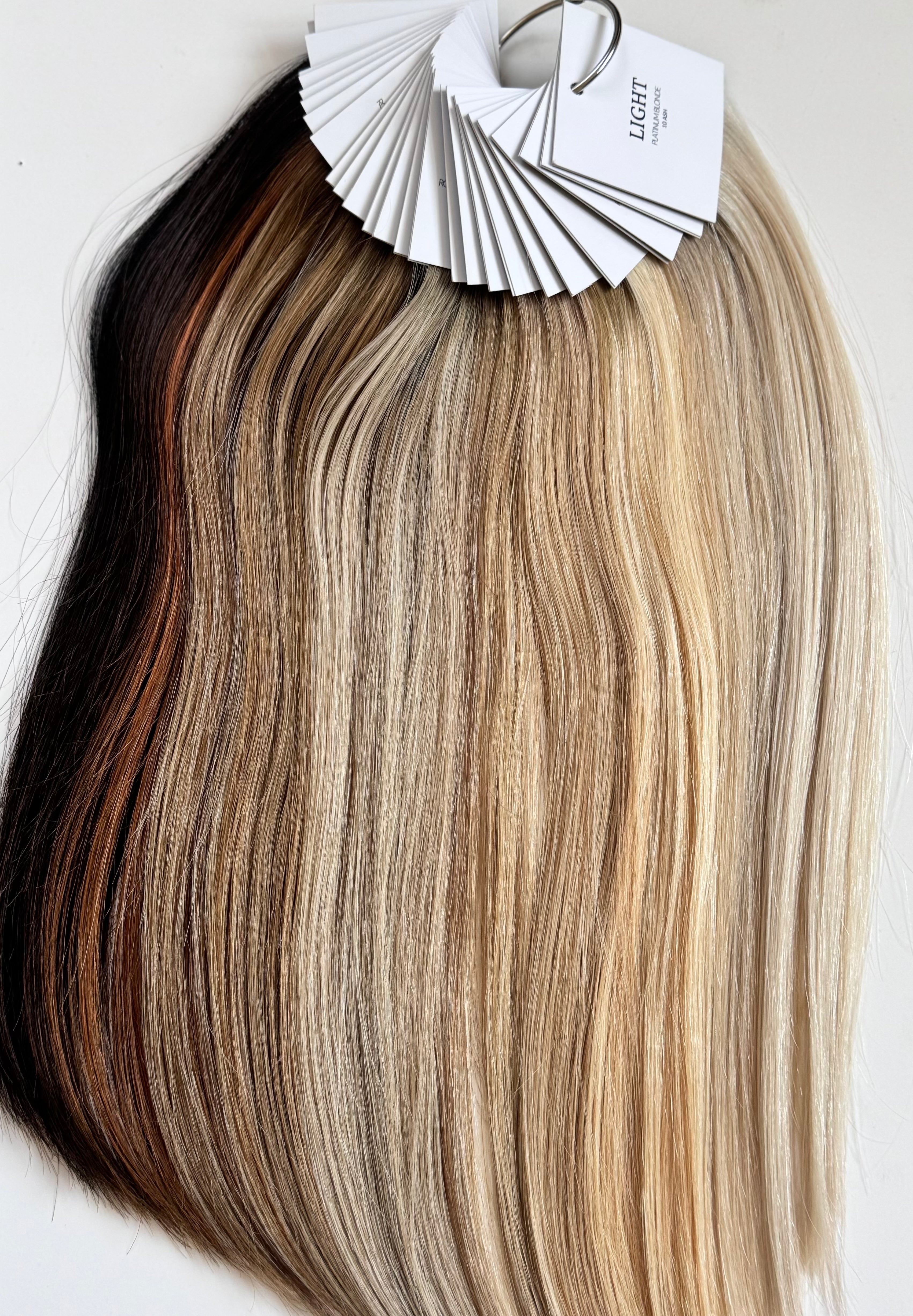Hair extension with color swatch on a white background