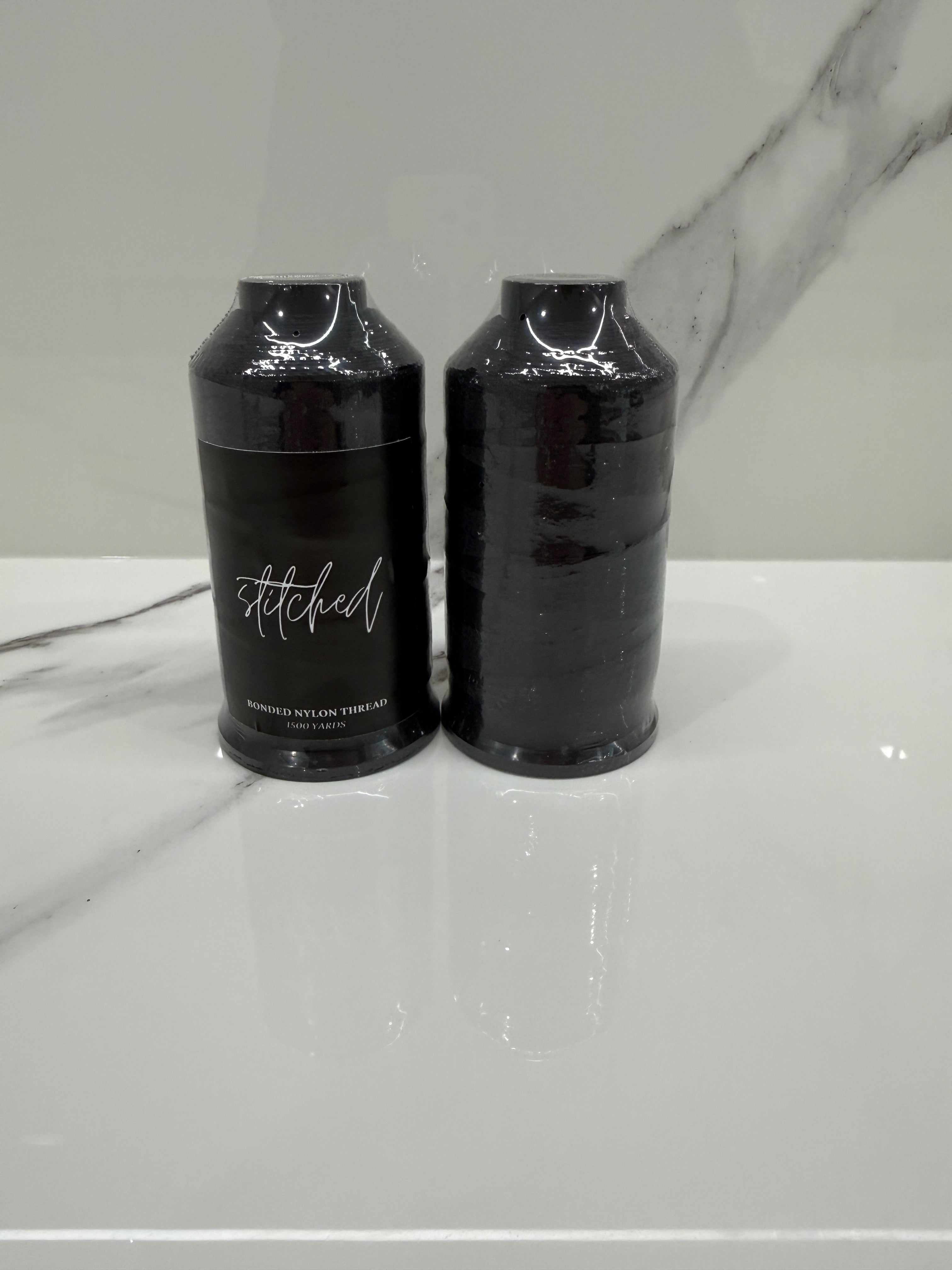 Close-up of Stitched™ Bonded Nylon Thread for professional hair extension installations