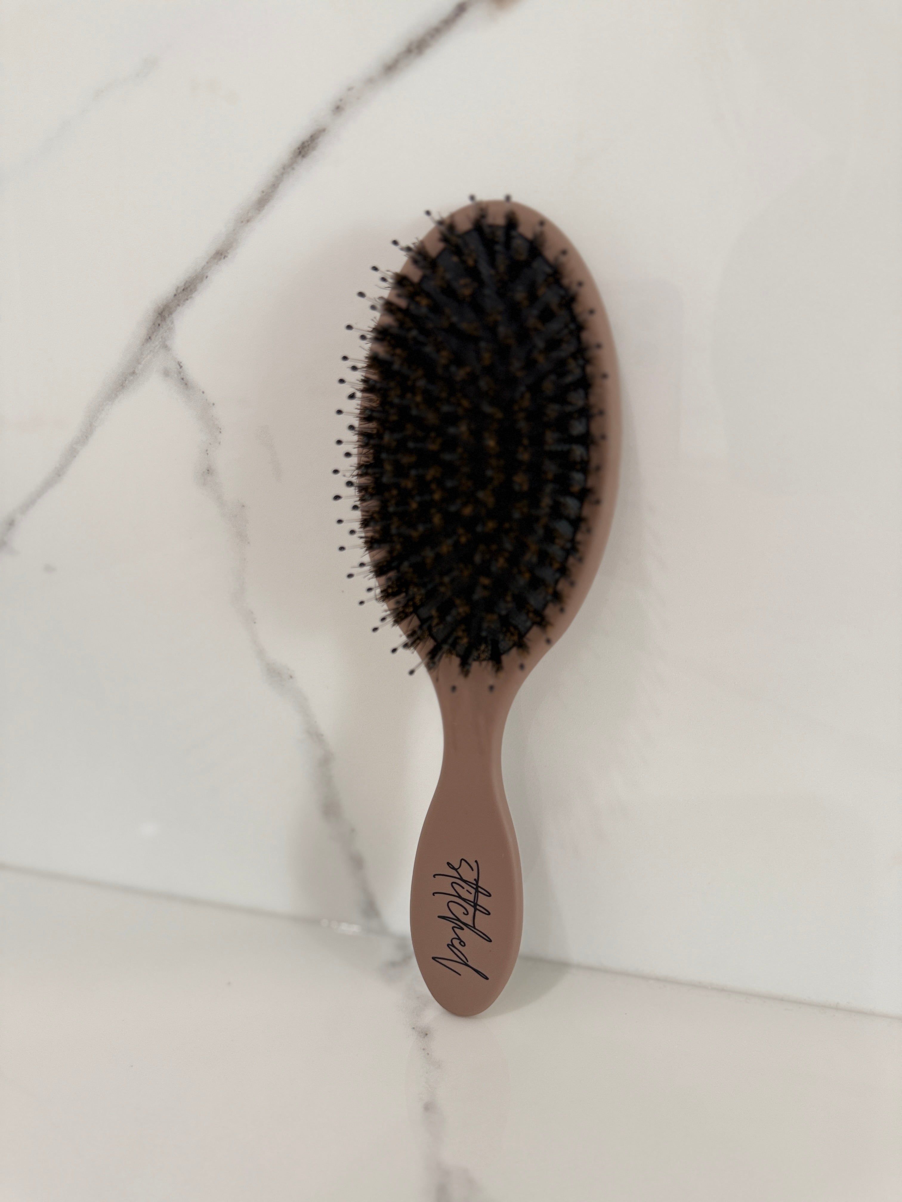 Stitched™ Signature Extension Brush designed for daily Seam Weft™ maintenance