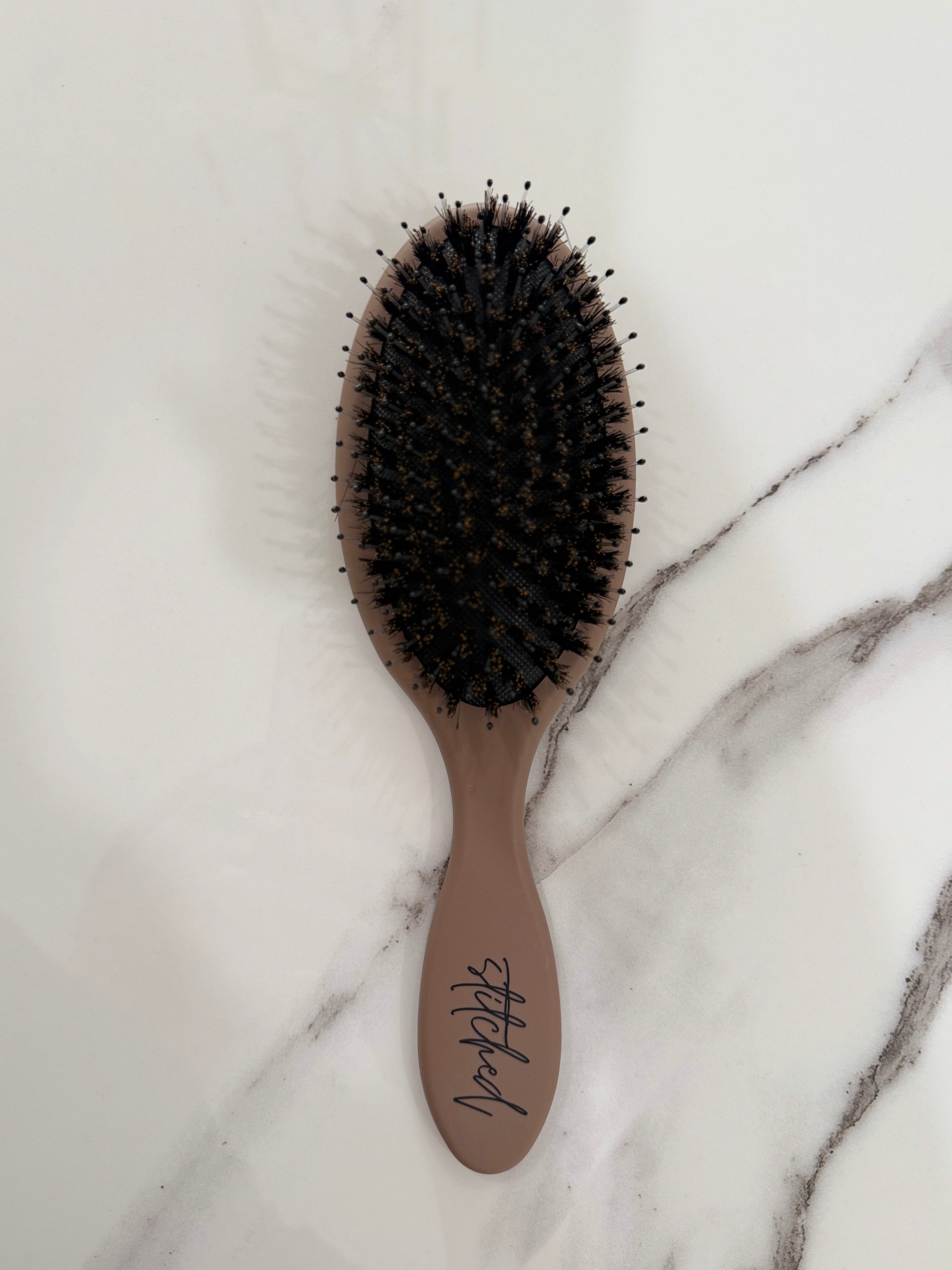 Extension-safe hair brush that helps reduce shedding and breakage