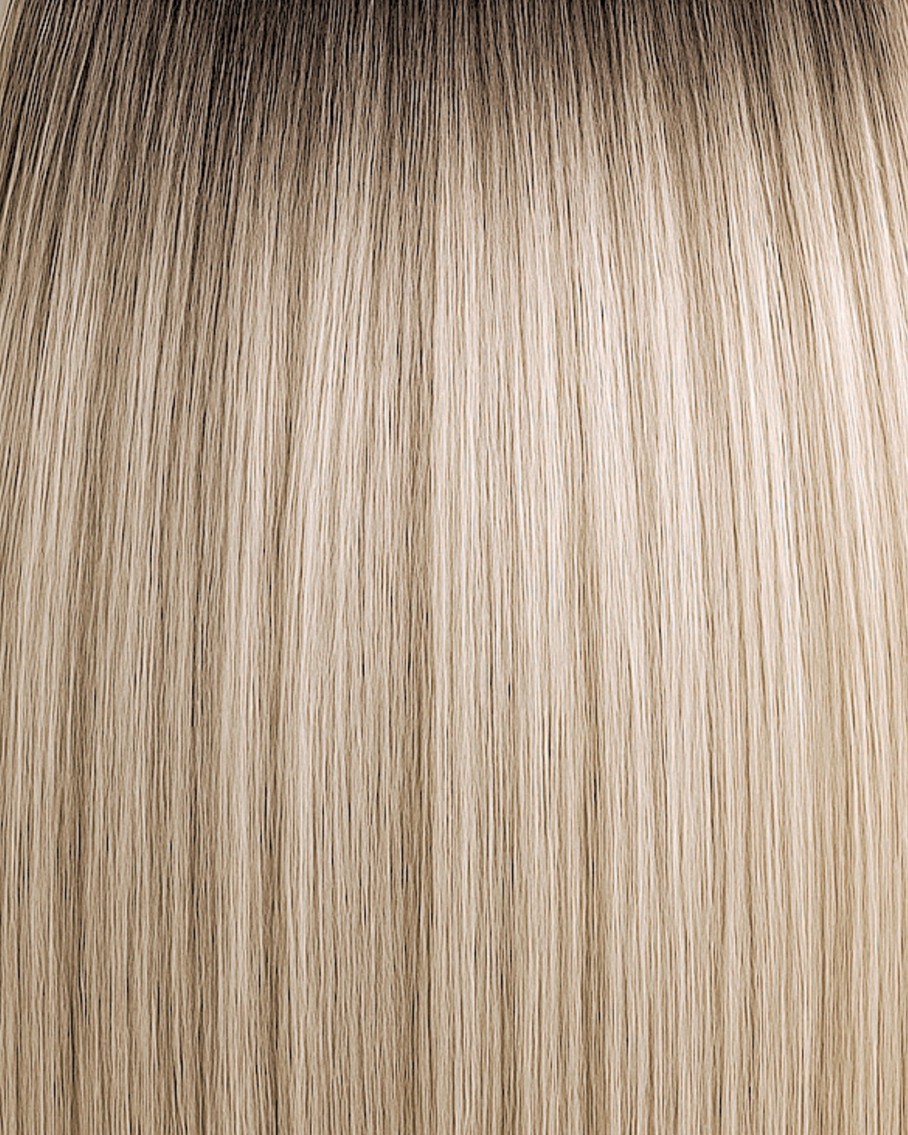 Stitched Hair Peace Genius Weft™ extensions in dimensional blonde with 9 neutral and 7 neutral tones and level 7 root, shown in smooth, cool-toned strands.