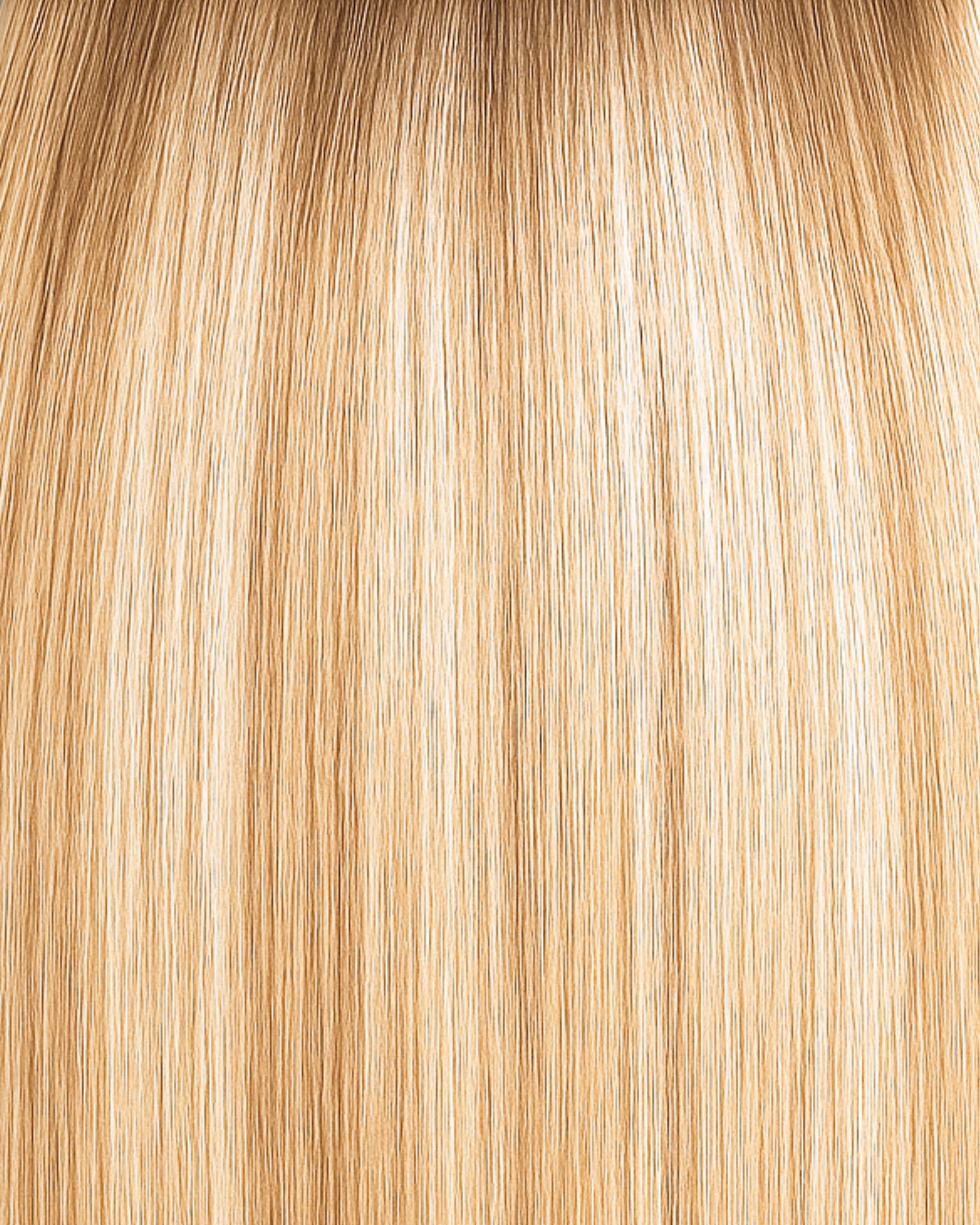 Stitched Hair Dream Genius Weft™ extensions in rooted champagne blonde with a level 10 ash and 8 warm blend, featuring a level 8 root.