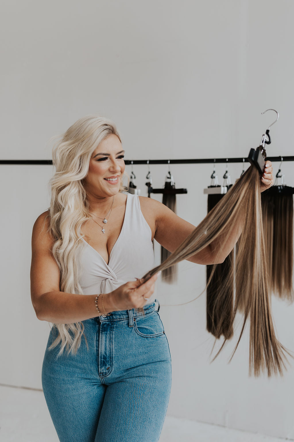 Founder Jessie showcasing her seamless Stitched Hair blend