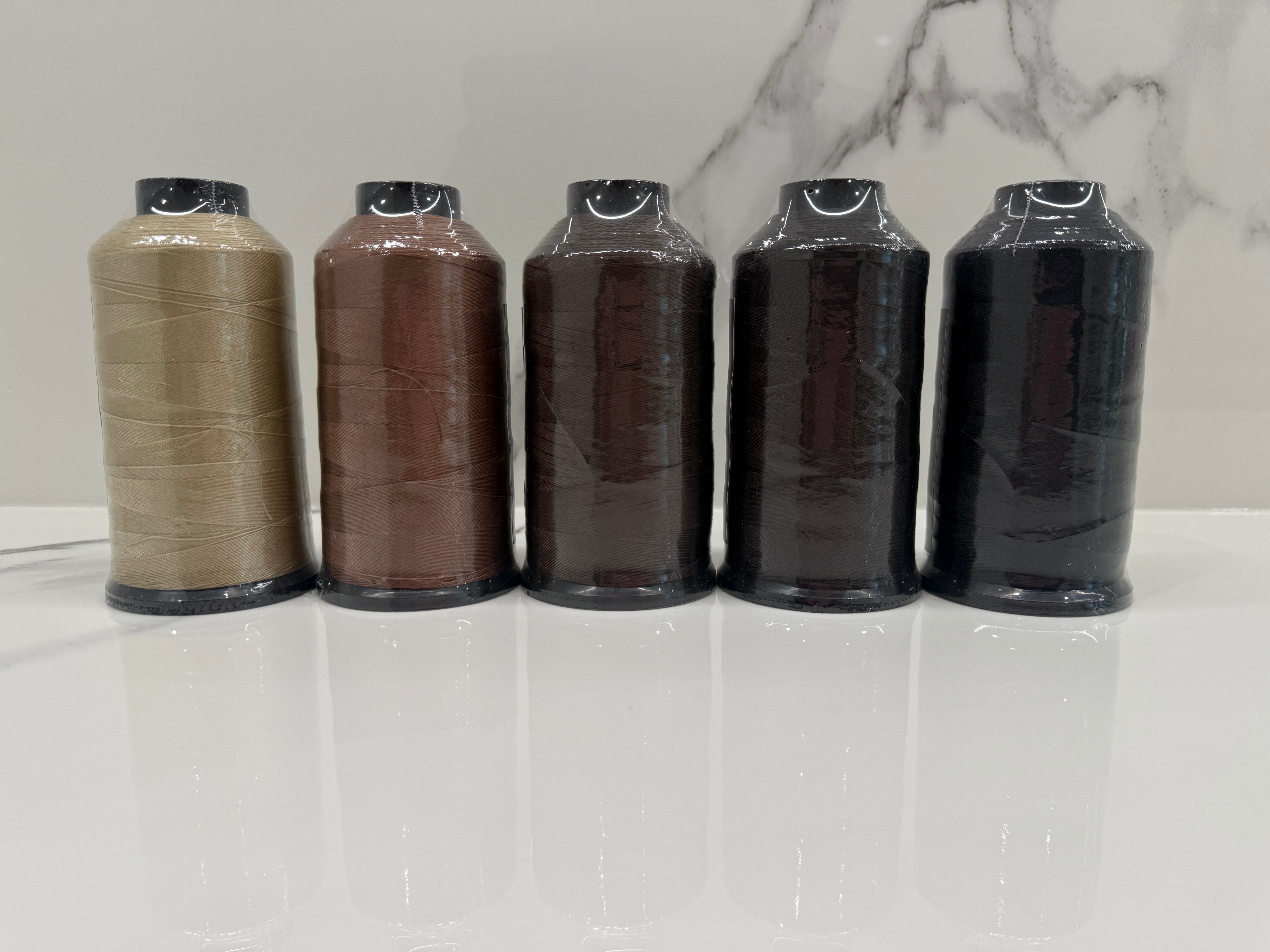Professional bonded nylon extension thread with smooth fray-resistant construction